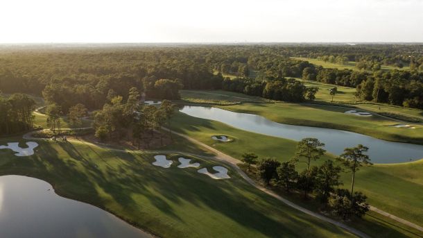 Aerial view of water hazards and bunkers on the Golf Club of Houston Tournament Course in Humble.
